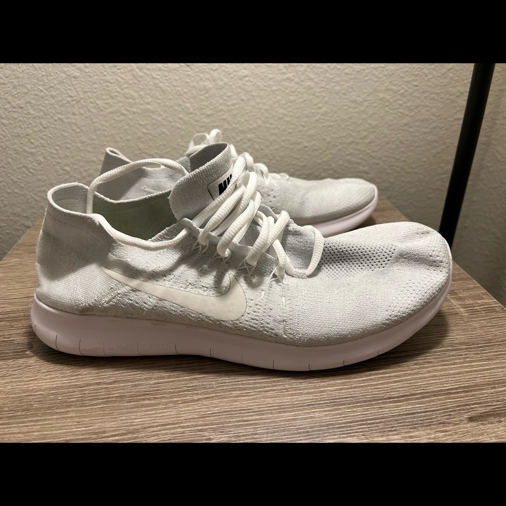 Nike Free Flynit all white worn a handful of times in great condition!